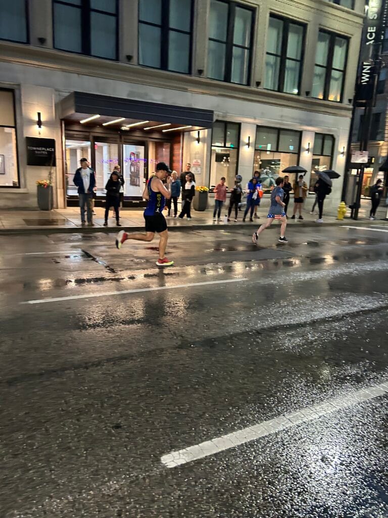 Running through 7th Street in the Flying Pig Marathon